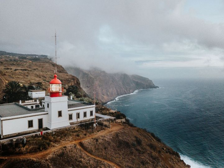 Ponta do Pargo Lighthouse above the cliffs and Atlantic Ocean in Madeira